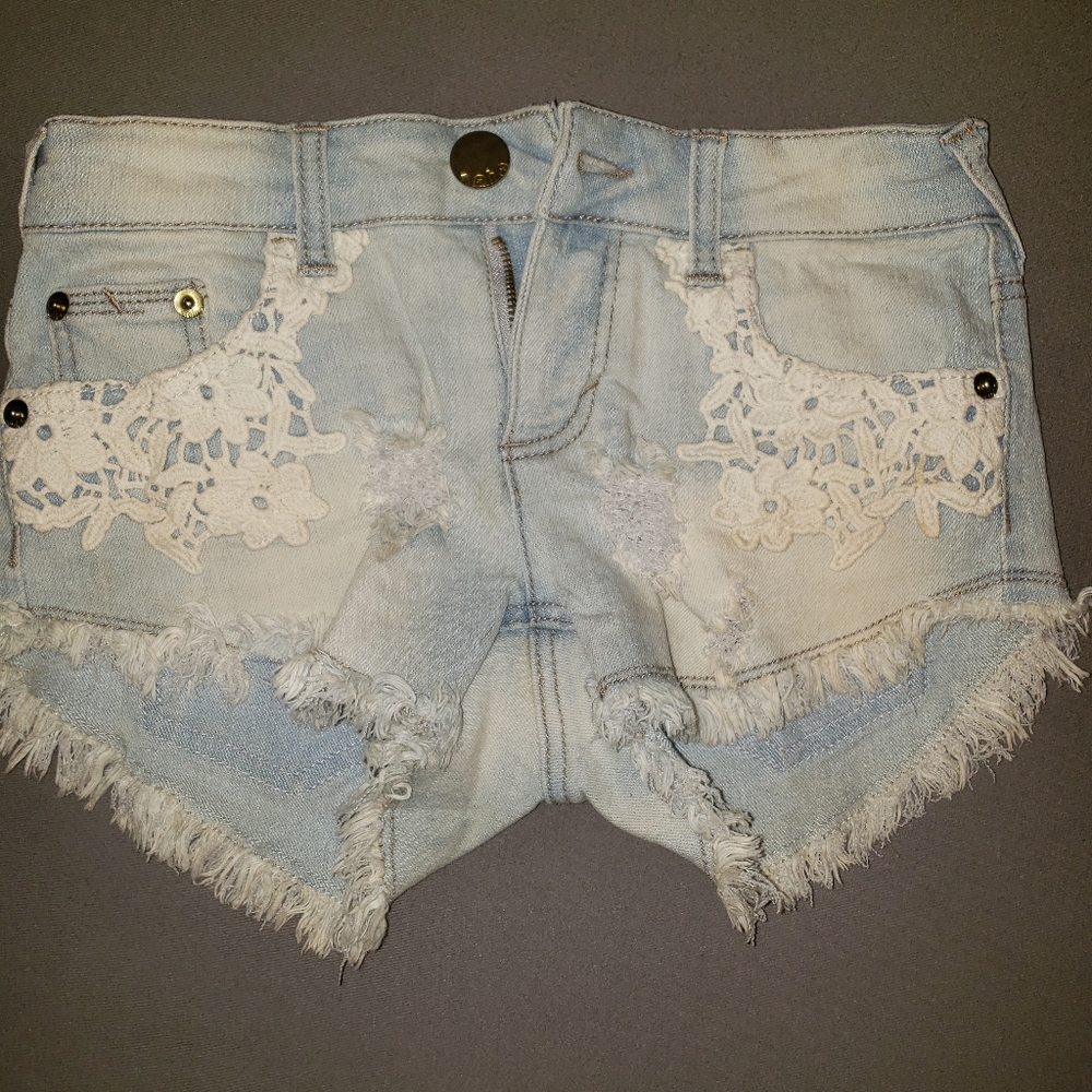 Denim shorts with lace detail